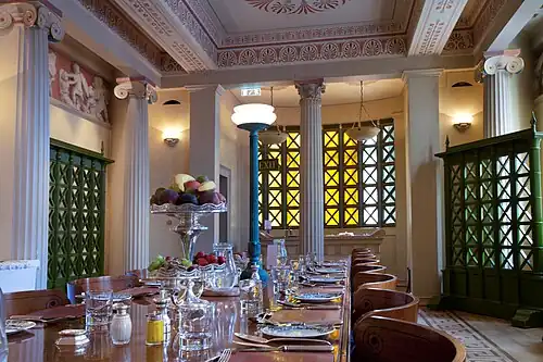 New Classical volutes of Ionic and Corinthian columns in the Gonville and Caius College Hall, Cambridge, UK, with capitals inspired by those from the Temple of Apollo at Bassae, by John Simpson, 1998