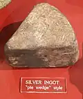 Precious metals including silver, copper, and gold were shipped back to Spain in various forms. This pie wedge of silver was shaped for shipment in a barrel.