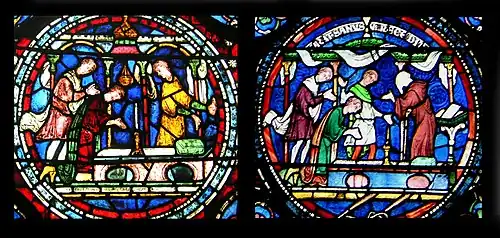 Round sections of two stained-glass windows both show a scene of a person kneeling at an altar while onlookers talk. The number of onlookers, small details and colour schemes are different.