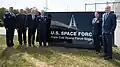 Lt. Gen. Nina Armagno, Rep. Bill Keating, Lt. Col. Timothy “Vax” Sheehan, and other dignitaries attend the installation's redesignation as a Space Force Station.