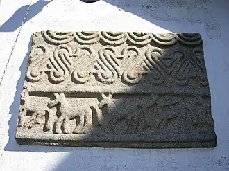Old reused stone slab, now in exposition in Formigueiros, Amoeiro, Galicia