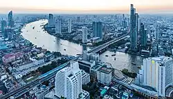 View of Chao Phraya River surrounded by buildings