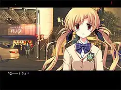A screenshot of the game, showing a stylized 2D illustration of a young woman in front of the 109 building in Shibuya, looking at the viewer. The view is padded by two thick black bars on the top and bottom: on the bottom bar, the dialogue is displayed in white, and on the top, a green and a red light are displayed.