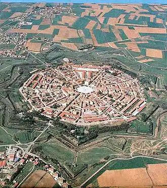 Image 10Palmanova, Italy, constructed in 1593 according to the defensive ideal of the star fort, today retains its distinctive geometry. (from History of cities)