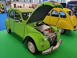 A Citroën 2CV retrofitted with an electric motor on display.