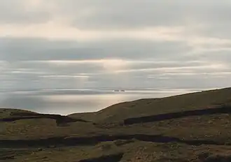 Peat banks on the island with the Mweelaun Islands beyond