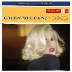 A blond woman is looking back over her right shoulder. She is wearing a dark blue blouse and red lipstick, and she is in a room. Above her image are two stripes. The upper is blue and the words "stereo" and "fidelity" are written in light yellow, and between them there is a long red arrow. The second strip is yellow; on it the words "Gwen Stefani" and "cool" are written in navy blue capital letters.