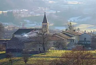 The church and surroundings in Cornod
