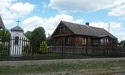 House in Dąbrowica Duża with a chapel