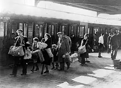 Jewish citizens being deported on the platform of Muiderpoort Station.