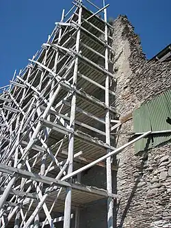 Wooden pole scaffold, 2011