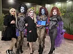 Harem Girls holding the OGAE Serbia award for the best song of Pesma za Evroviziju '25.