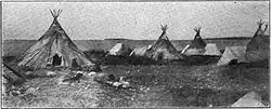 Tipis of the Tłı̨chǫ (Dogrib) First Nations on the shores of Slave Lake at Fort Resolution, circa 1907