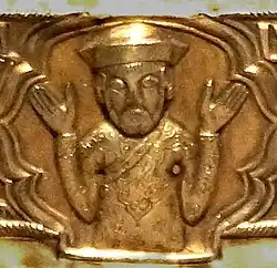Armenian Prince Eacchi Proshian on a reliquary circa 1300. He is wearing a Mongol-style dress (cloud collar).[18]