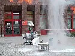 Aftermath of explosion, with unburnt flour on the ground