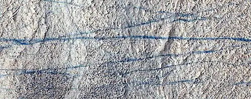 Close color view of dust devil tracks, as seen by HiRISE under HIWish program