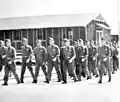 Flight Cadets marching to a ground class.