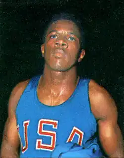 Earl McCullouch in a USA shirt, shown from