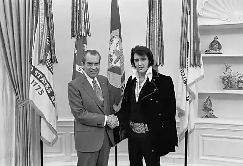 Image 12 Elvis Presley meets Richard Nixon Photograph: Oliver F. Atkins American singer Elvis Presley meeting then-president Richard Nixon on December 21, 1970. During the meeting, the singer expressed his patriotism and his contempt for hippies, the growing drug culture, and the counterculture in general. Presley then asked Nixon for a Bureau of Narcotics and Dangerous Drugs badge, to signify official sanction of his patriotic efforts. Nixon gave Presley the badge and expressed a belief that Presley could send a positive message to young people and that it was therefore important he retain his credibility. More selected pictures