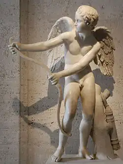 Classical statue of Cupid with his bow