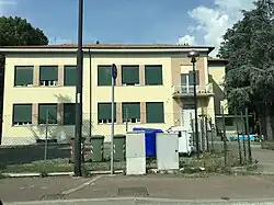 Former Cavazzoli elementary school (now Pensionato Cavazzoli)​​‌