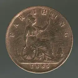 A copper coin with Britannia on it