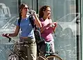 Female tourists in 2005 sporting colorful mid-2000s athletic fashions.