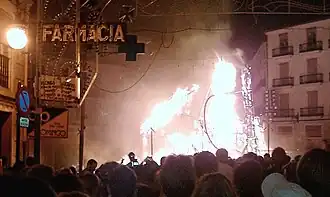 The monumental Egyptian falla, just as the frame of its tallest tower collapses