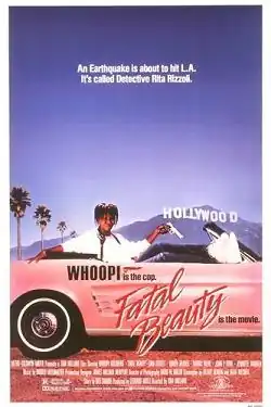 Movie poster showing Whoopi Goldberg in police attire holding a gun