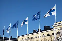 Finnish and NATO flags flying at the Ministry for Foreign Affairs of Finland on the day of accession, 4 April 2023