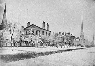 SW Corner of Griswold and Fort Streets (current location of the Greater Penobscot Building), c. 1870. The house in the foreground was constructed for John Palmer in 1829 and demolished in 1869[12]