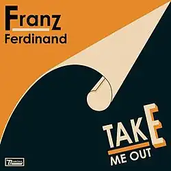 A yellow background showing a black page turned down towards the bottom right corner. At the top left, Franz Ferdinand is written in black against the yellow background. On the lower left, TAKE ME OUT is written in off-white against the black background. The letter E in 'take' is featured prominently.