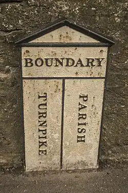 Sign marking boundary between parish and turnpike trust responsibility, Frome, Somerset