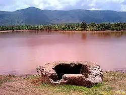 Gandhamardan Hills on backdrop of a Checkdam.