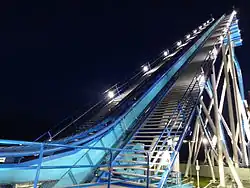 Steel structure illuminated by lights at night