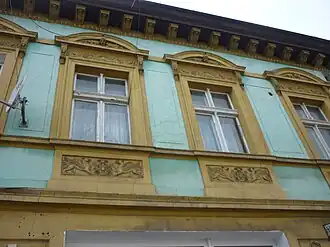 Detail of window pediments and cartouches