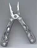 A Gerber "Suspension" multi-tool, with pliers open. Pliers are spring-loaded, for easy use.