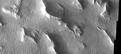 Gigas Sulci, as seen by THEMIS. Wavy linear ridges are dunes. Dark slope streaks are visible on some slopes if you click on image for larger view.