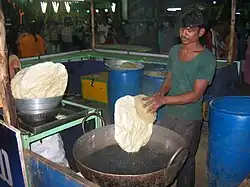 Deep fried papad being prepared at an exhibition in Guntur, India