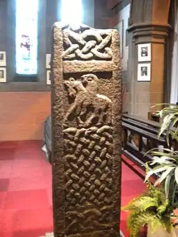 Photograph of an inscribed stone cross-shaft