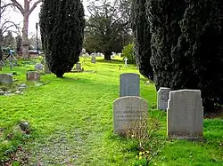 A small row of gravestones