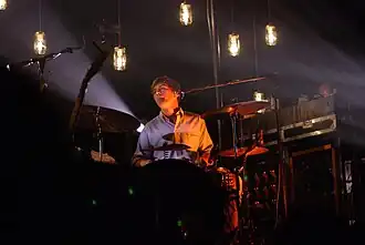Bear performing with Grizzly Bear in 2009