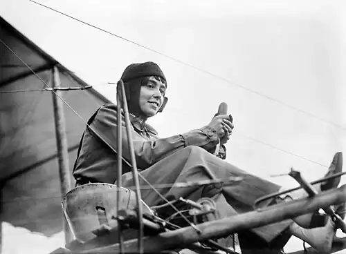 Image 14 Hélène Dutrieu Photo credit: Bain News Service Hélène Dutrieu, shown here in her aeroplane ca. 1911, was the fourth woman in the world (the first from Belgium) to earn a pilot's license and reputedly the first woman to carry passengers and to fly a seaplane. Besides being a pilot, she was a cycling world champion, stunt cyclist, stunt motorcyclist, automobile racer, wartime ambulance driver, and director of a military hospital. More selected pictures