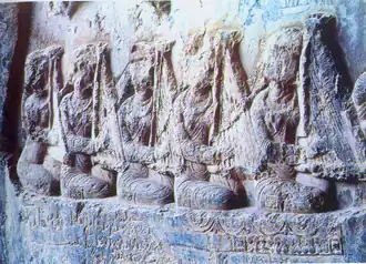 Image 38c. 379 CE Bas relief of Sassanid women playing the chang in Taq-e Bostan, Iran (from History of music)