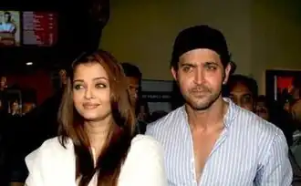 Hrithik Roshan and Aishwarya Rai are looking away from the camera.
