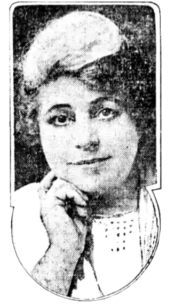 A newspaper photo of a white woman with large dark eyes