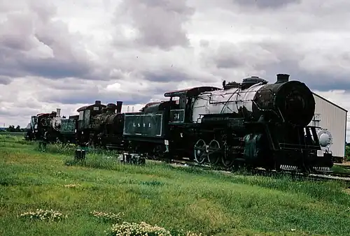 LS&I No. 34 on display at the Illinois Railway Museum, with Louisiana and Arkansas No. 99 and Union Pacific No. 428 parked behind it