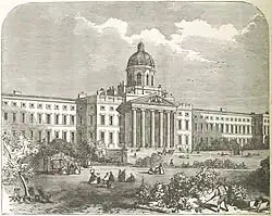 Front of an imposing Georgian-style building with columned portico at the entrance