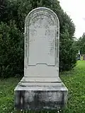 Old headstone with rounded top