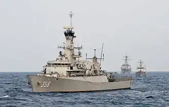 The Indonesian navy corvette KRI John Lie (358) lines up for a combined gunnery exercise behind the U.S. Navy littoral combat ship USS Fort Worth during the underway phase of CARAT Indonesia 2015.